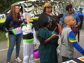 kids lined up to spin the wheel